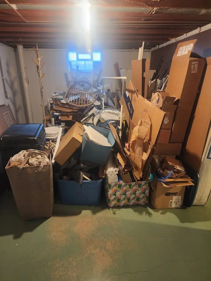 Roll-off dumpster container at job site for 8 Yard Dumpster Rental in Beatrice